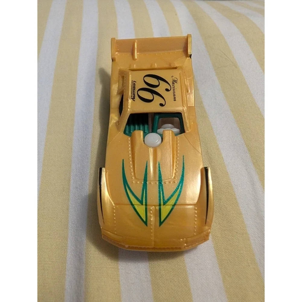 2015 HOT WHEELS NIGHT STORM MAXIMUM LEEWAY #66 GOLD 1:64 DIECAST 2 7/8 RACE CAR